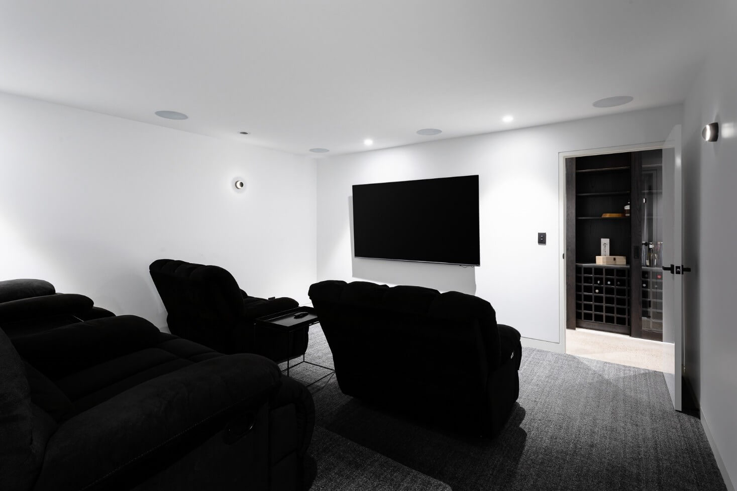 Shui Painting Gallery -  Spacious Theatre Room with Black Colored Things