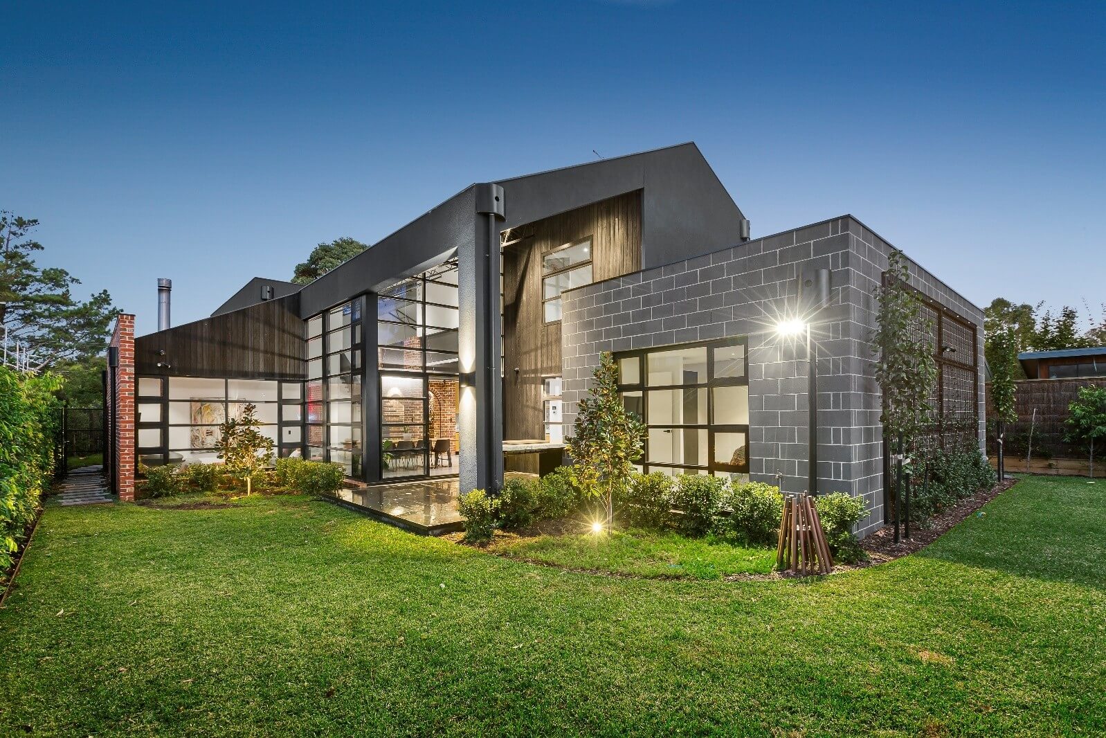 Shui Painting Gallery -  Exterior View of Brick Grey Motiff Building